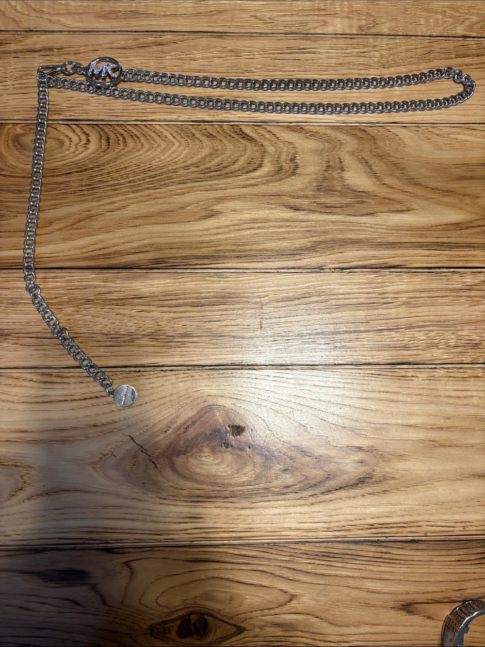 Michael Kors Women’s Silver Chain-Link Logo Belt